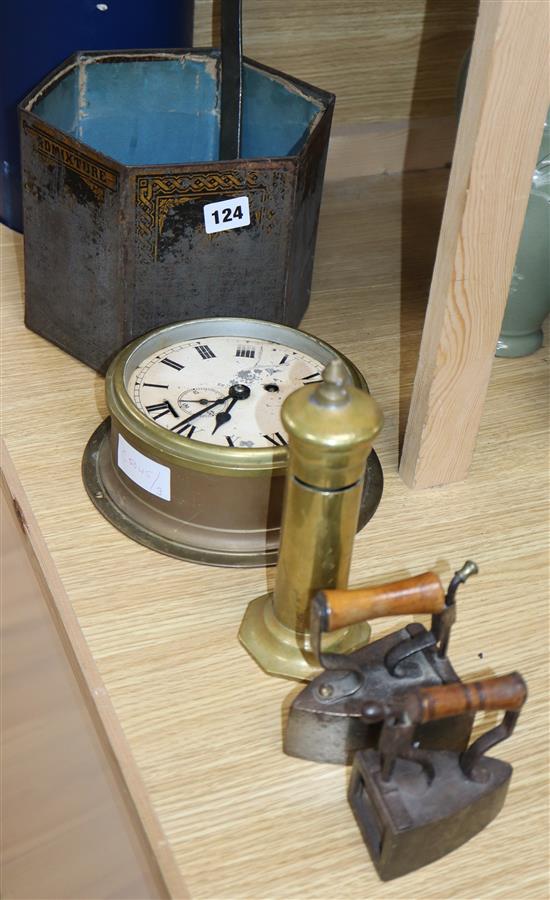 A novelty brass letter box, a money box, a clock and two irons